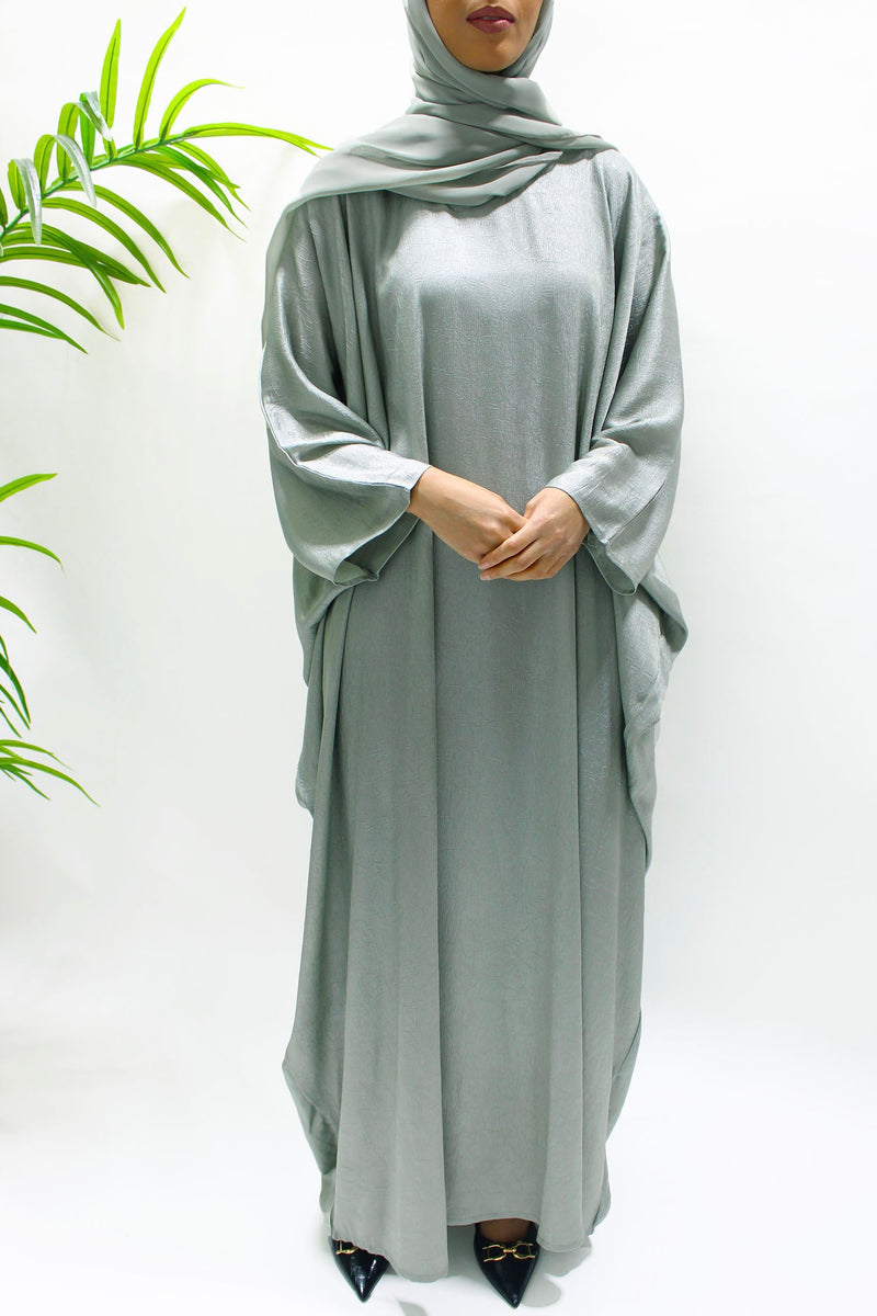 Sage modest wedding guest outfit with matching hijab