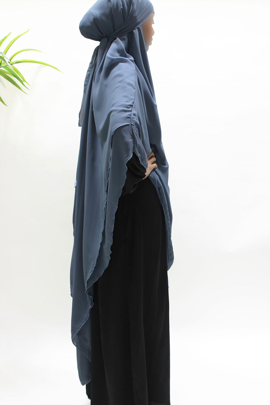 Side view of the grey diamond chiffon khimar showing its soft drape and length