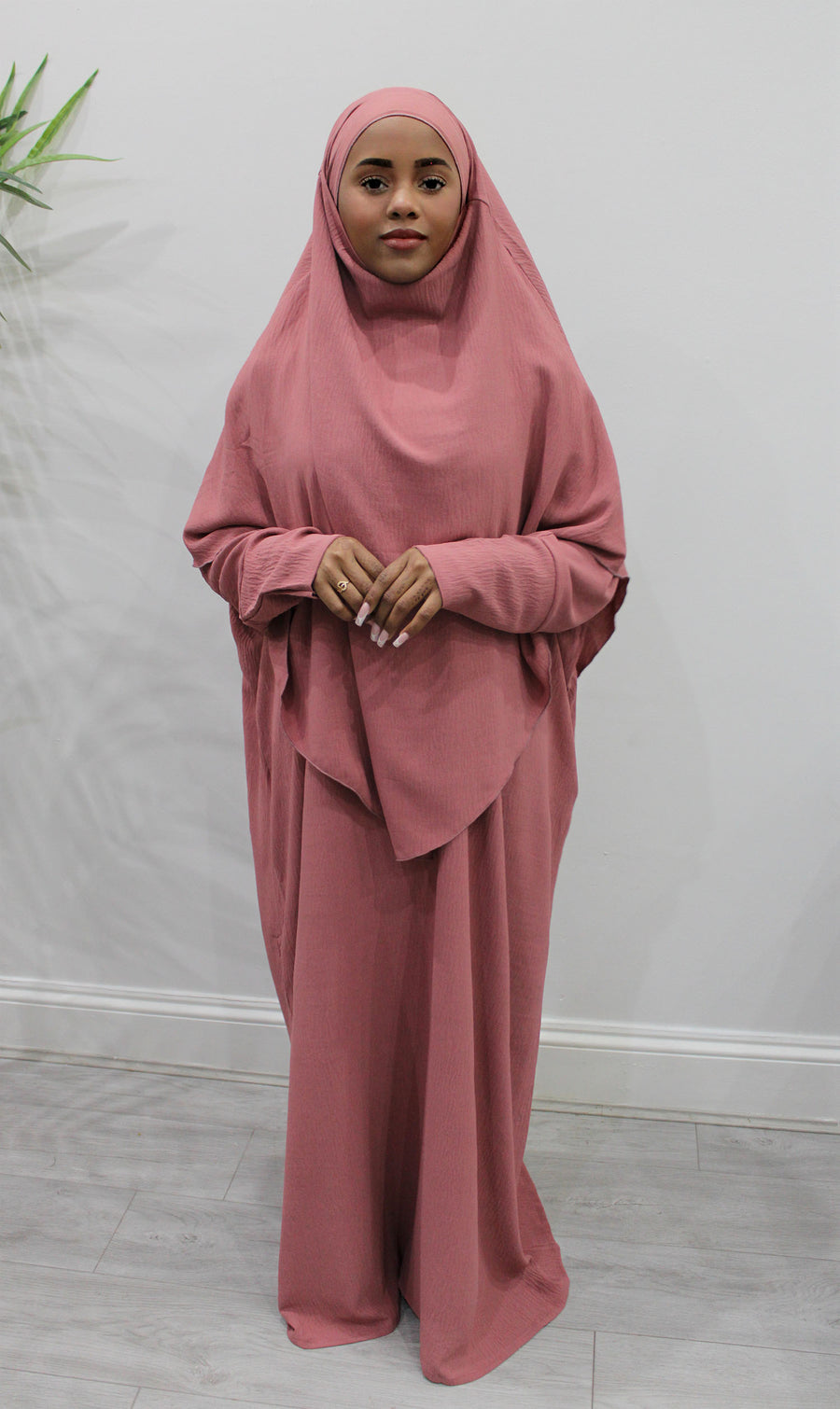 Coral abaya and khimar set styled together