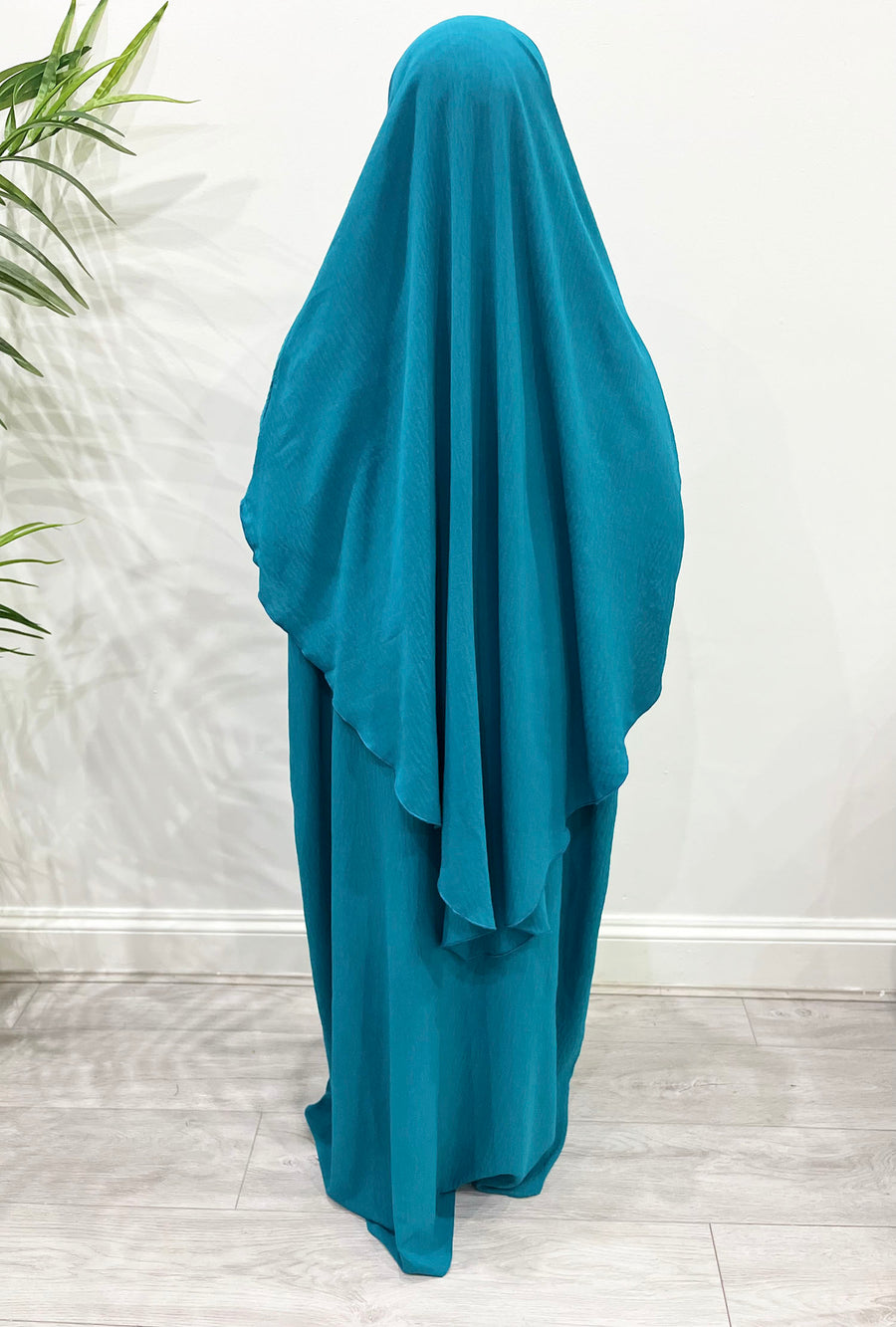 Dark turquoise abaya and khimar set styled together