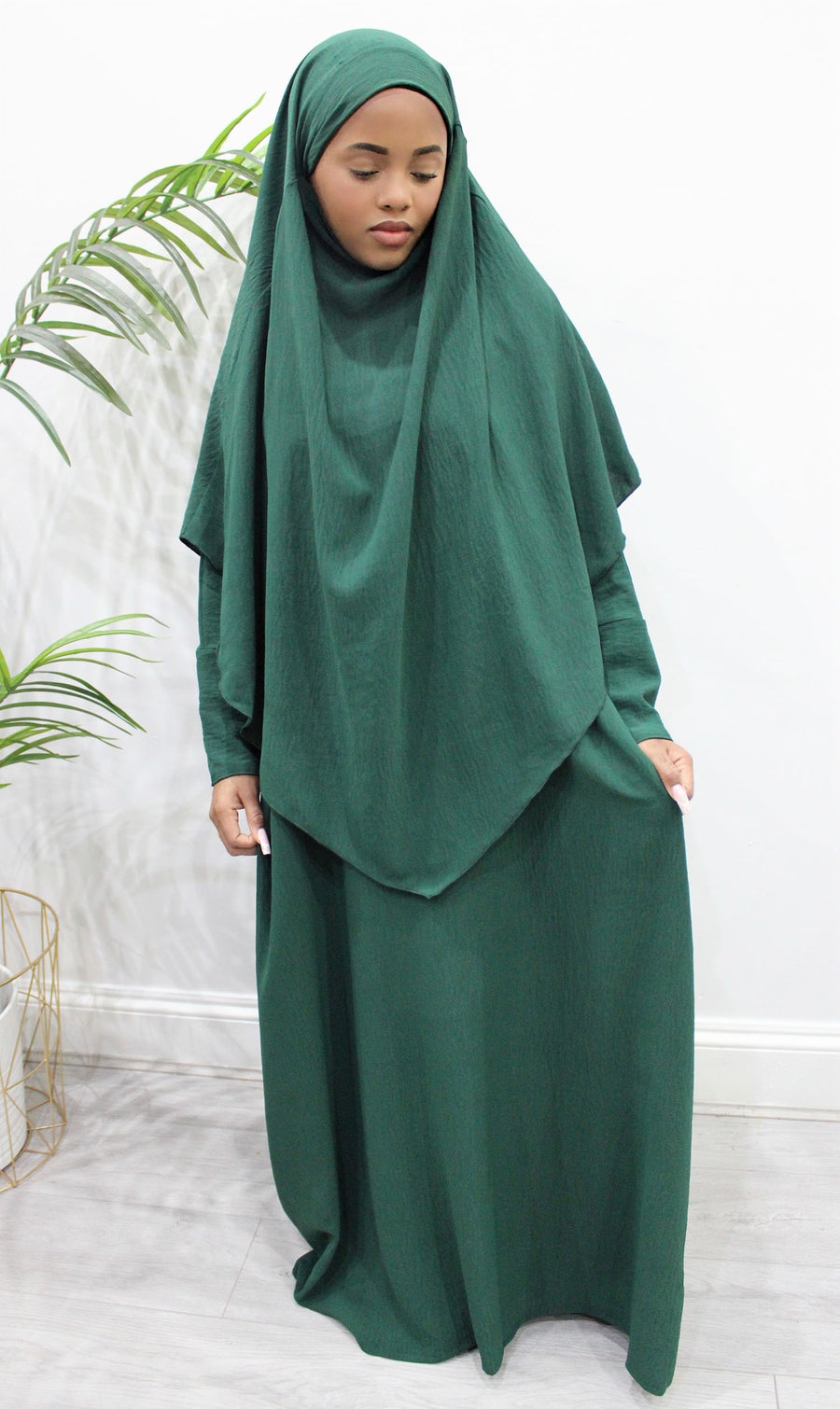 Close-up of the forest green soft crepe fabric
