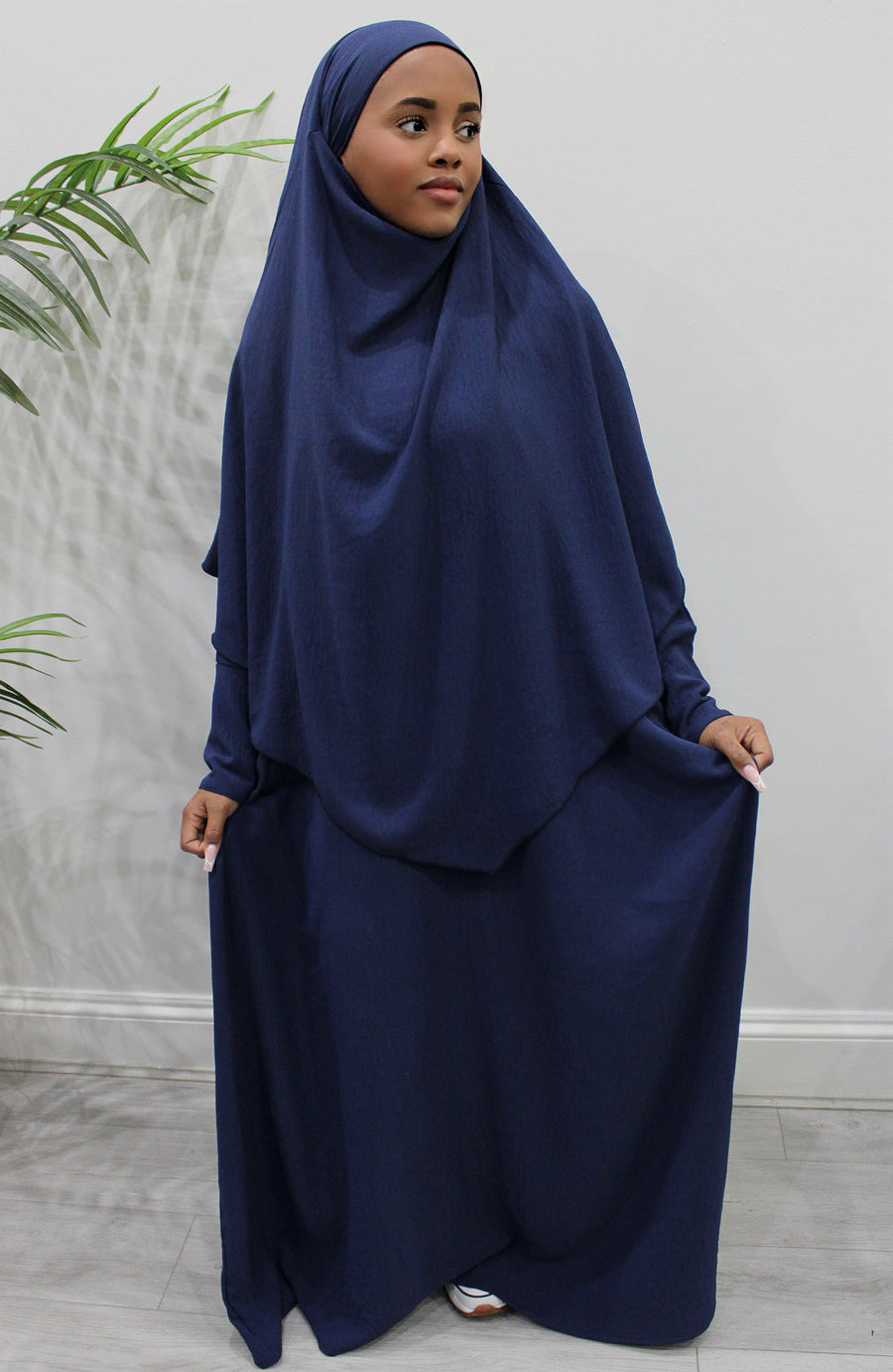 Back of the navy khimar showing the tie straps