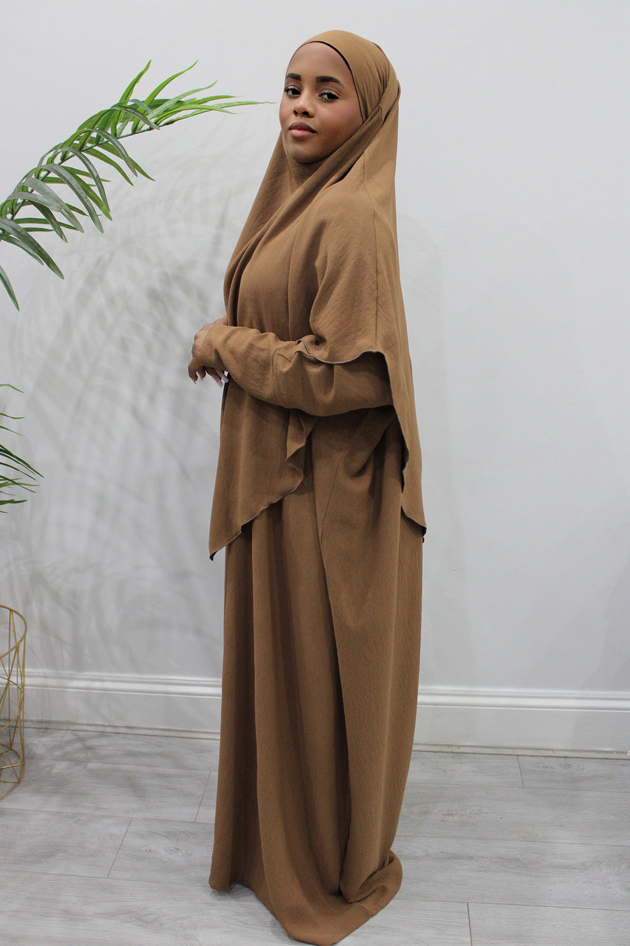 Toffee overhead abaya showing the loose fit and crepe drape