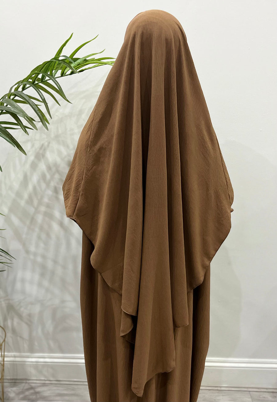 Toffee abaya and khimar set styled together