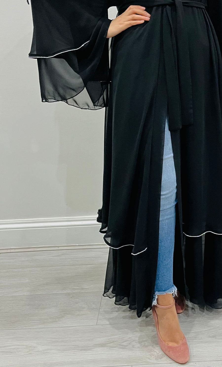 Close-up of the crystal embellishments on the black chiffon abaya