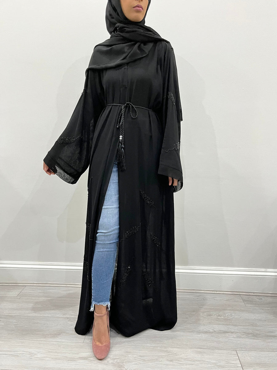 Black double chiffon abaya shown with its matching hijab and belt