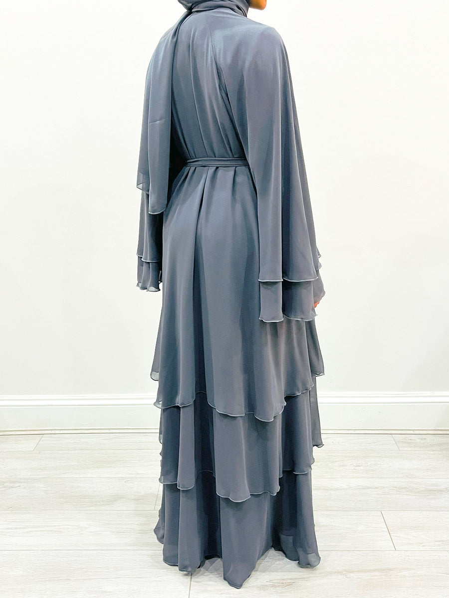 Dolphin gray chiffon abaya belted at the waist showing the layered drape