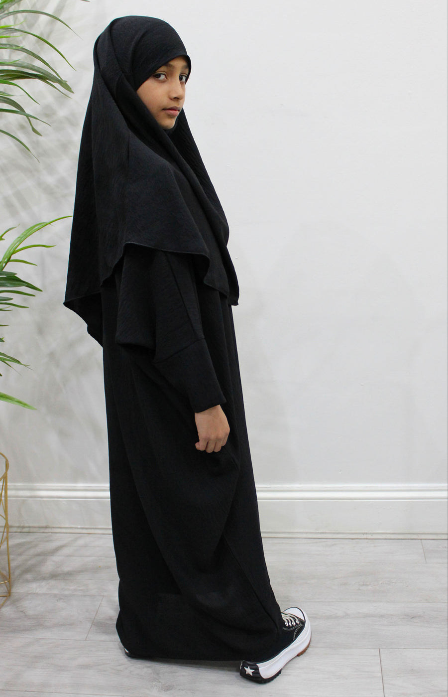 Amani's black girls' abaya and khimar set in soft crepe