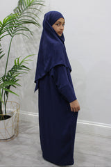 Girl wearing Amani's navy abaya and khimar set, front view