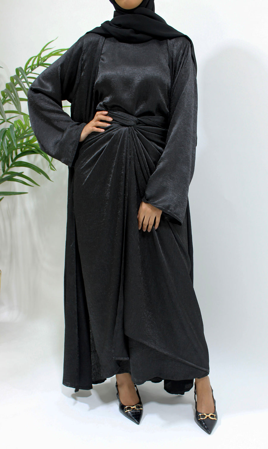 Black crushed satin abaya set styled with matching hijab for Eid and weddings