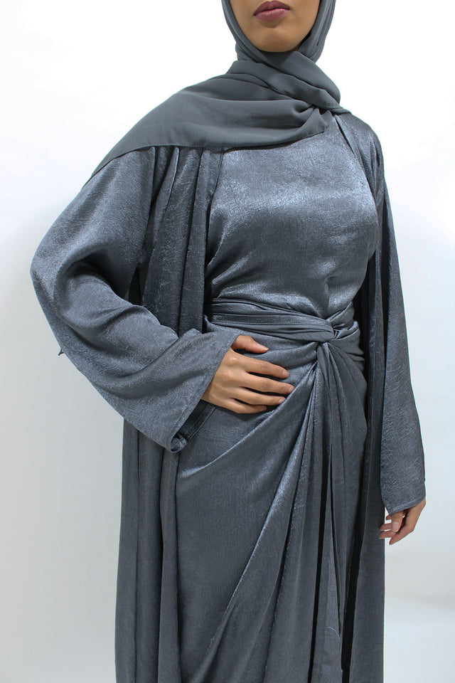 Cool grey crushed satin four-piece open abaya set shown front-on with kimono abaya, inner dress and wrap skirt