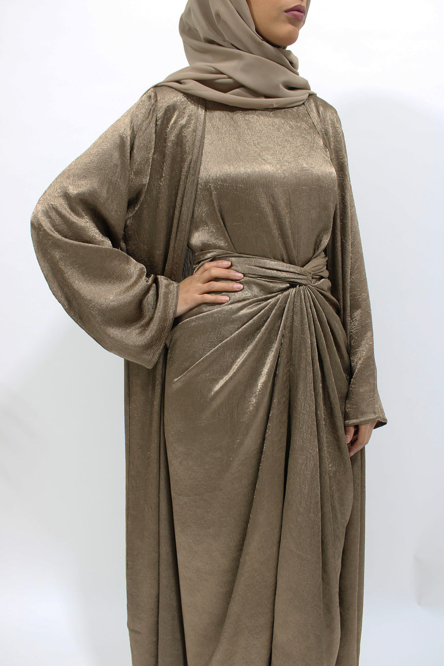 Luxor gold crushed satin abaya set styled with matching hijab for Eid and weddings
