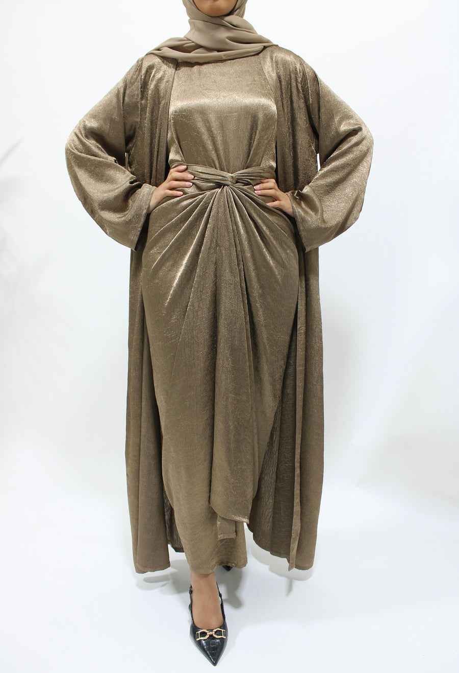 Side view of the Luxor gold crushed satin open abaya showing its luminous textured sheen