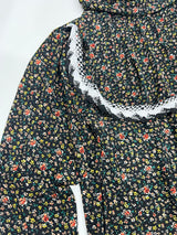 Little girl wearing Amani's roses print one-piece slip-on prayer dress with attached hijab