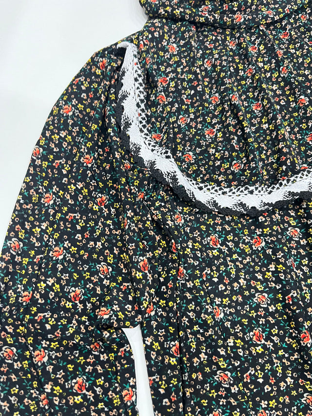 Little girl wearing Amani's roses print one-piece slip-on prayer dress with attached hijab