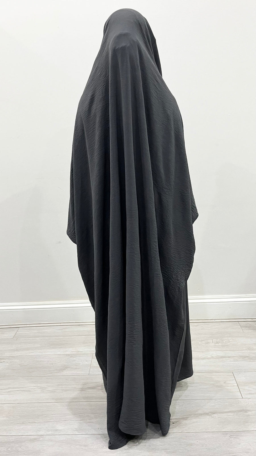 Close view of the ruched cuff on the dark grey full jilbab