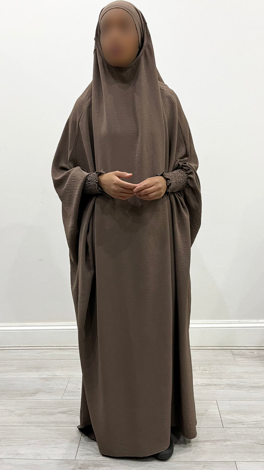 Dark taupe one-piece overhead full jilbab with ruched cuffs, front view