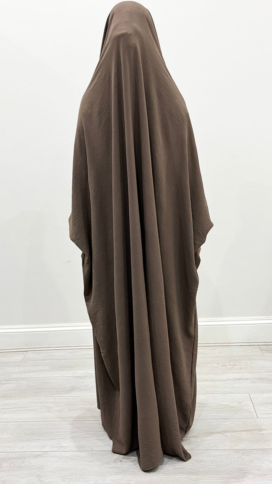 Dark taupe full jilbab showing its soft crepe drape and full-length coverage