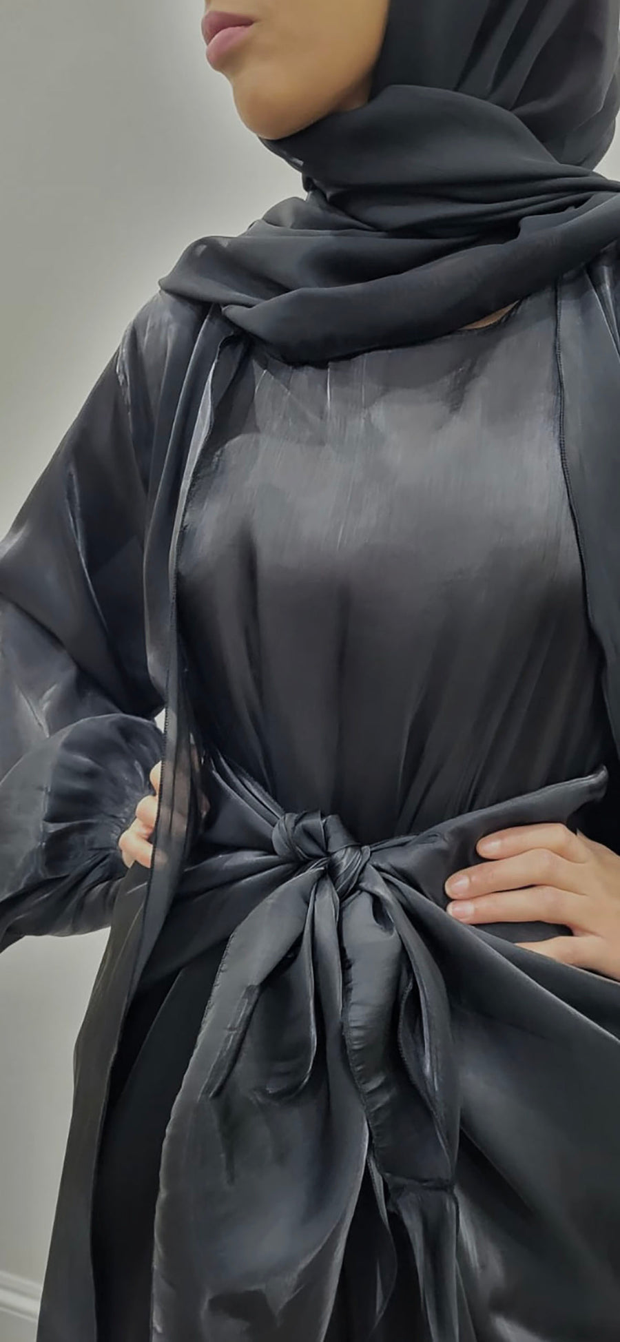 Black organza silk three-piece open abaya with embellishment, inner slip dress and hijab, front view