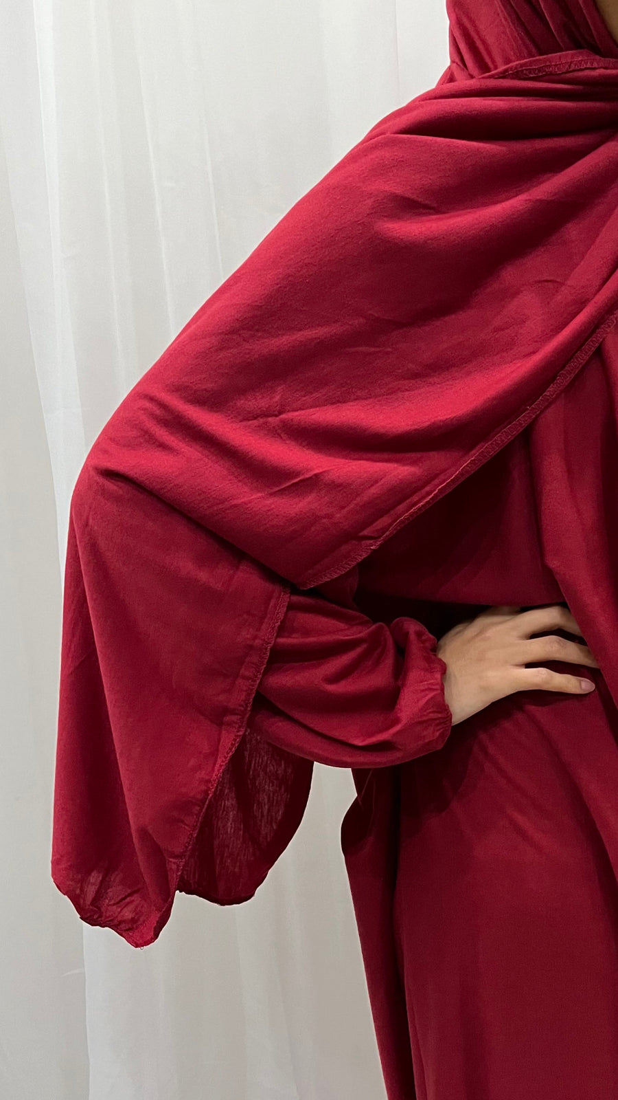 Red cotton stretch prayer dress showing the attached wrap-around hijab