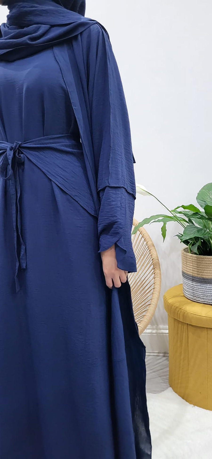 Navy open abaya styled over its matching inner slip dress