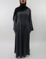 Amani's dark grey long sleeve maxi dress with bell sleeves front view