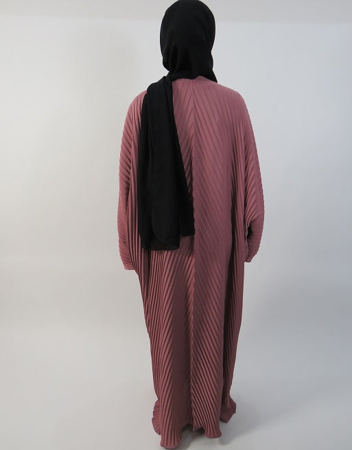 Peach pleated abaya showing batwing sleeves