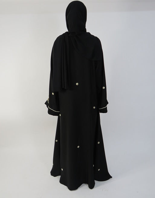 Open abaya showing gold and black beadwork detail