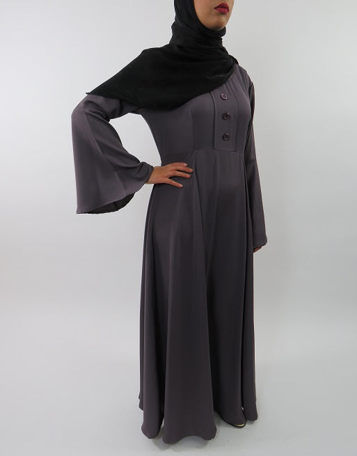 Side view of Amani's bell-sleeve A-line maxi dress