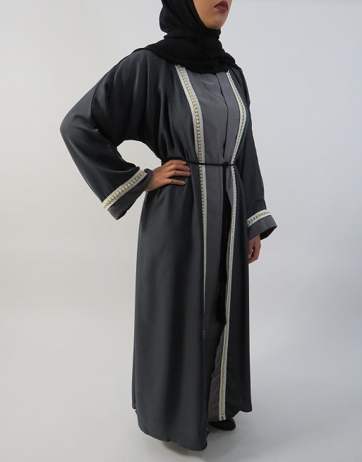 Grey two-tone abaya showing pearl embellishment along the front and sleeves