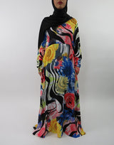 Amani's blue rose print long sleeve A-line maxi dress front view