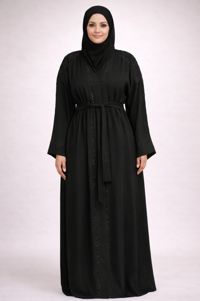 Detail of the shoulder embellishment on the black abaya jacket