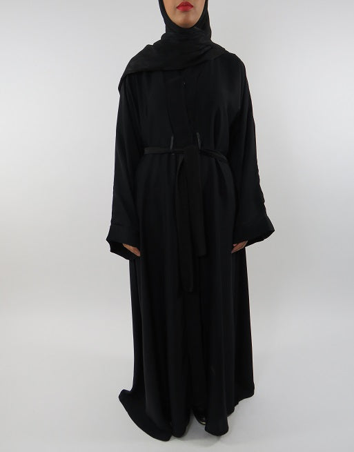 Plain black open Neda abaya with belt, front view