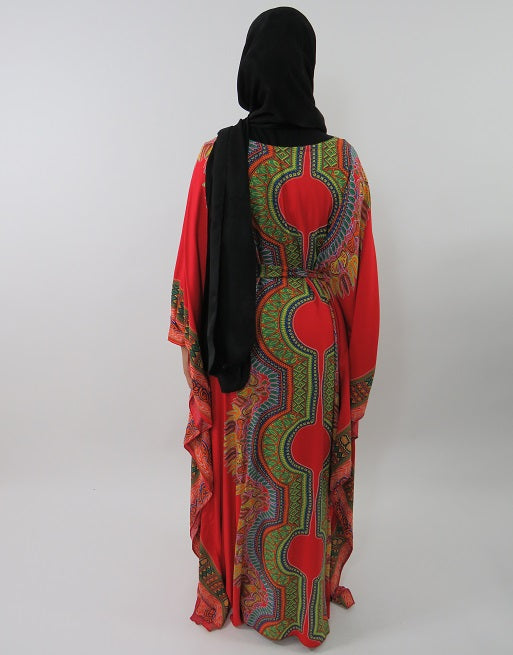 African-inspired print detail on the red cotton kaftan dress