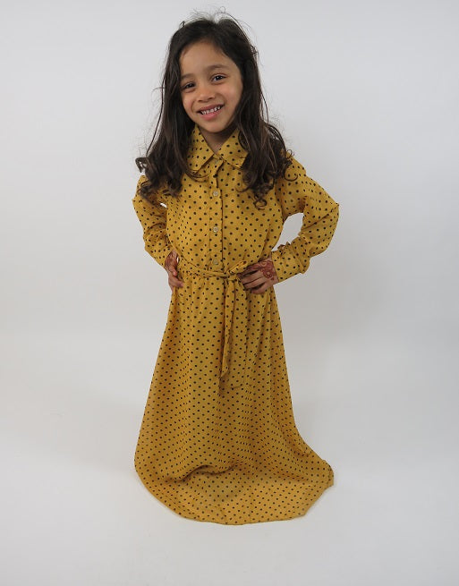 Yellow polka-dot kids dress showing shirt collar and button detail