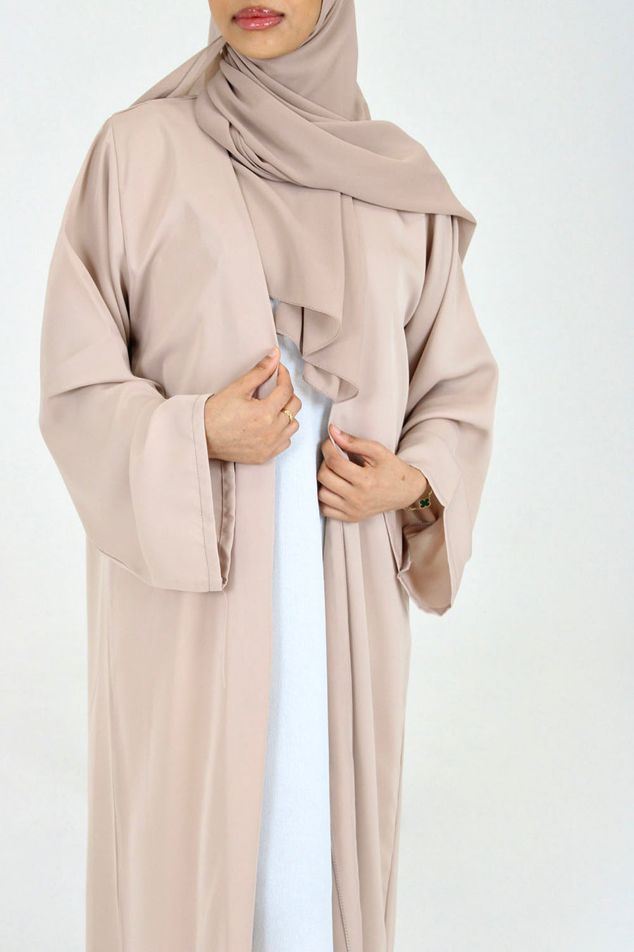 Beige duster abaya showing the long, smooth Neda drape
