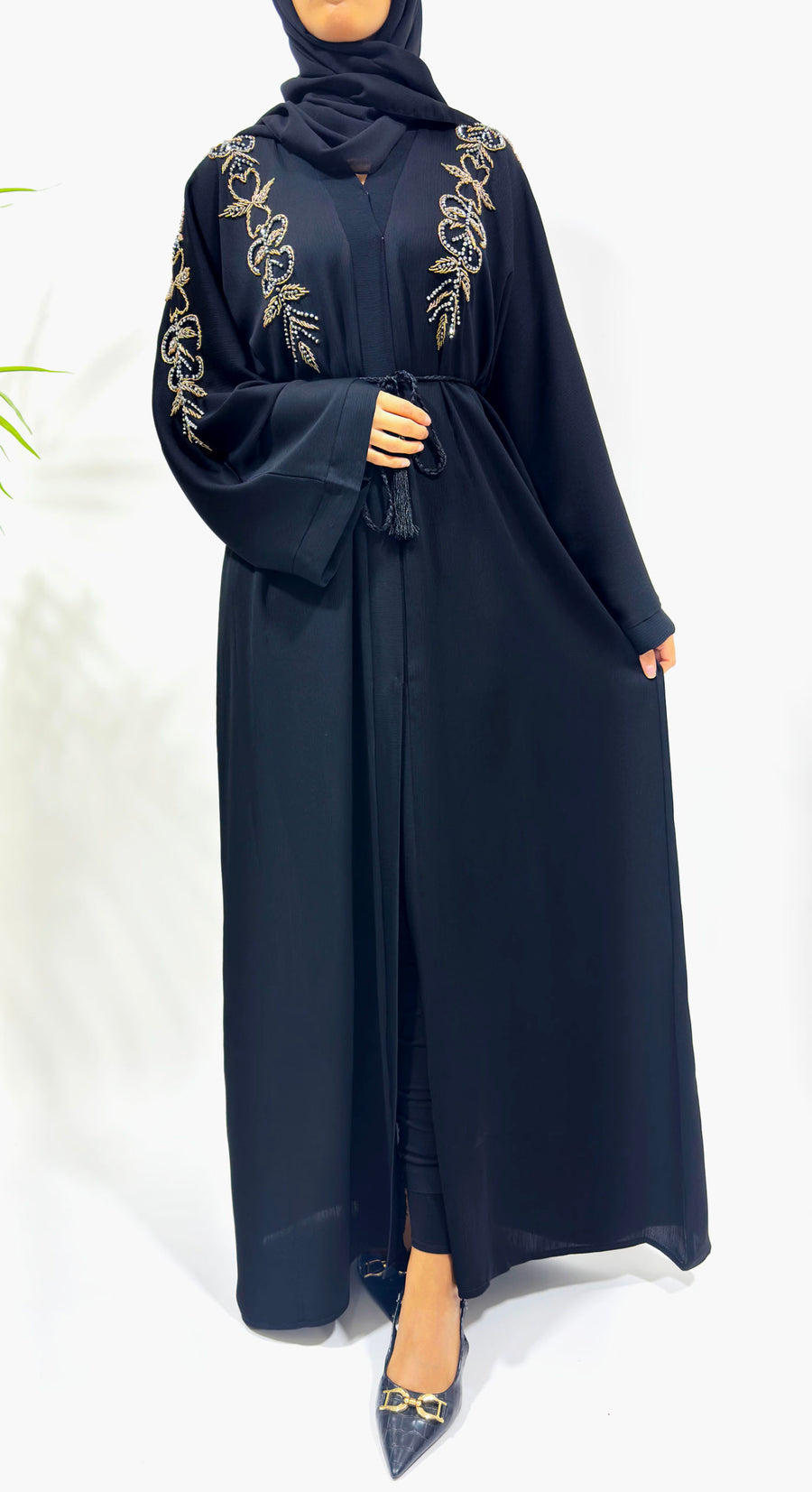 Black embellished abaya showing the Zoom fabric drape