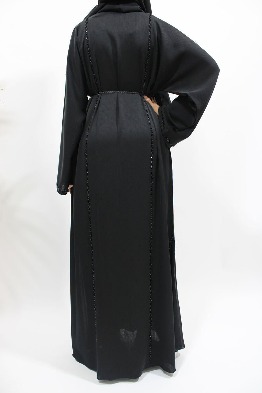 Full-length view of the black diamante-piped open abaya with matching hijab