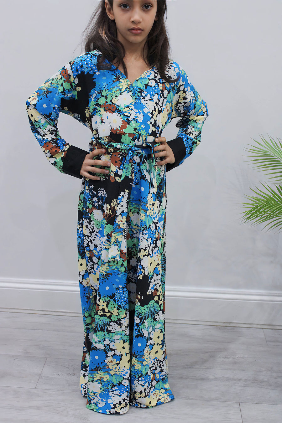 Blue floral kids maxi dress showing the full umbrella-cut skirt