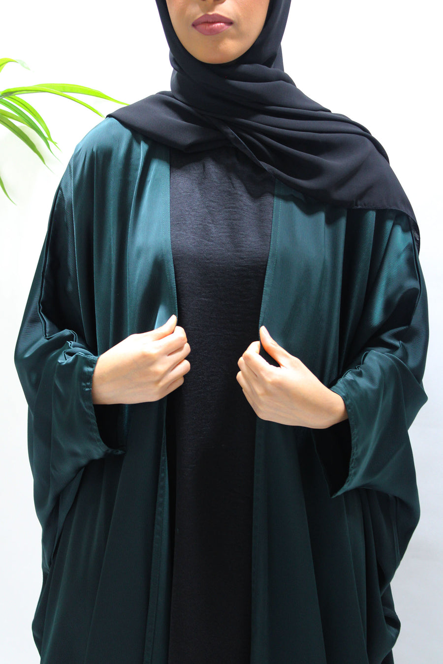 Bottle green sleeveless inner dress included with the farasha set