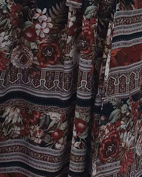 Bow collar and print detail on the brown cotton maxi dress