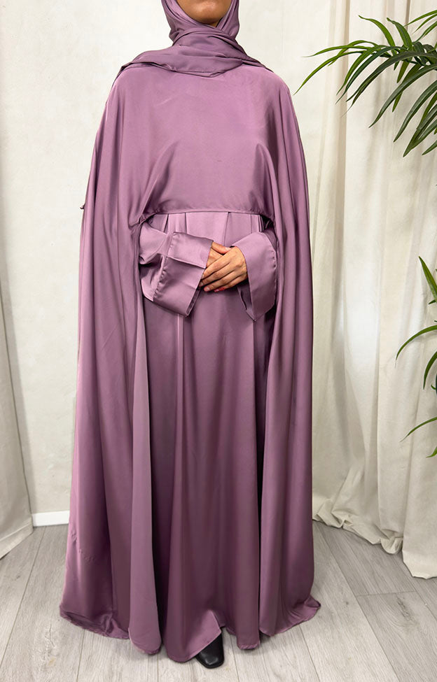 Side view of the heather mauve cape abaya set showing the open satin cape and waist belt