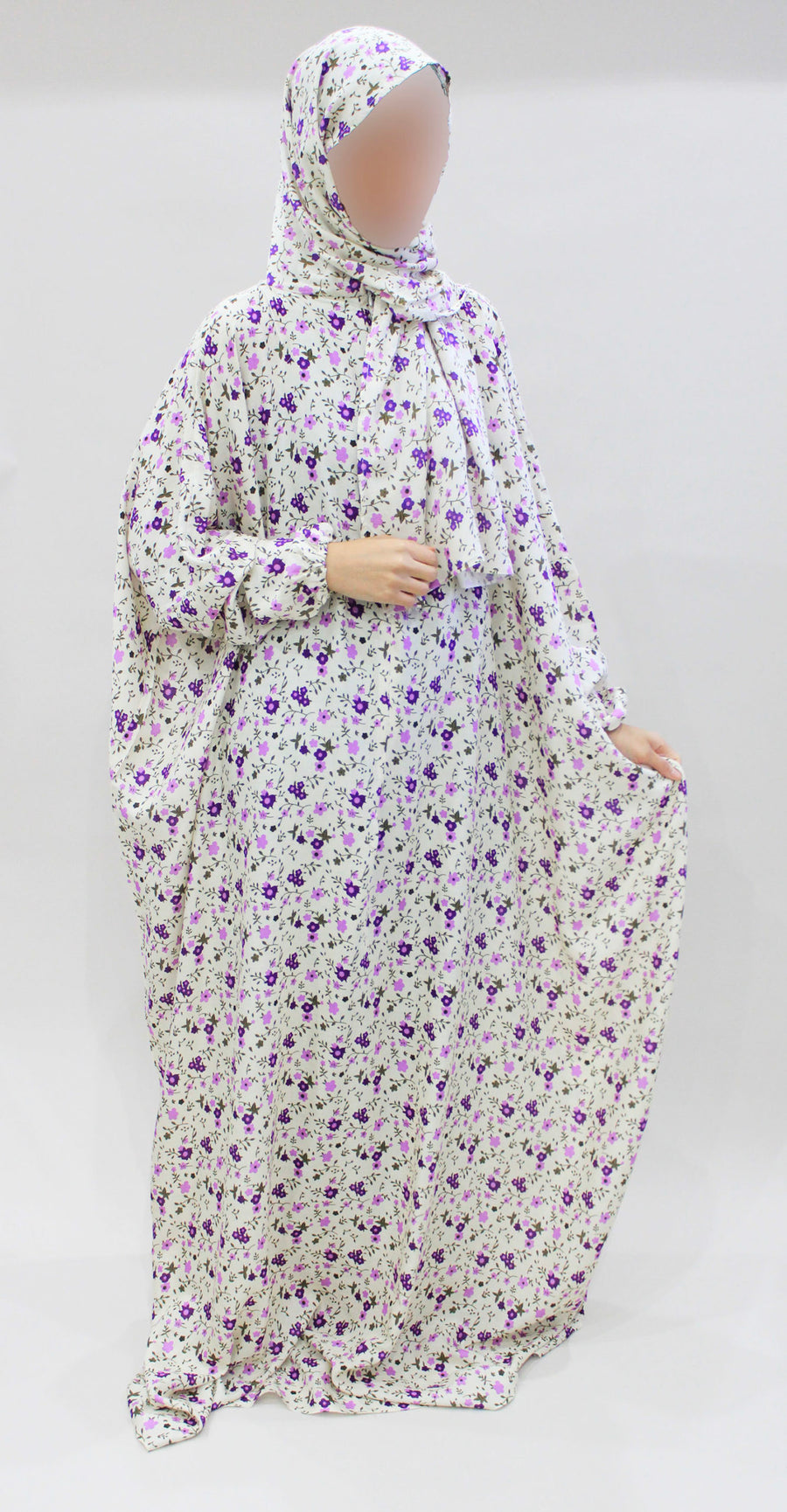 Buttermilk floral prayer dress showing the print and elasticated cuffs