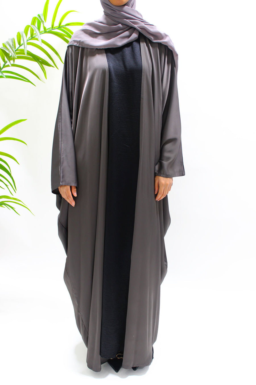 Textured satin detail on the dark taupe farasha abaya