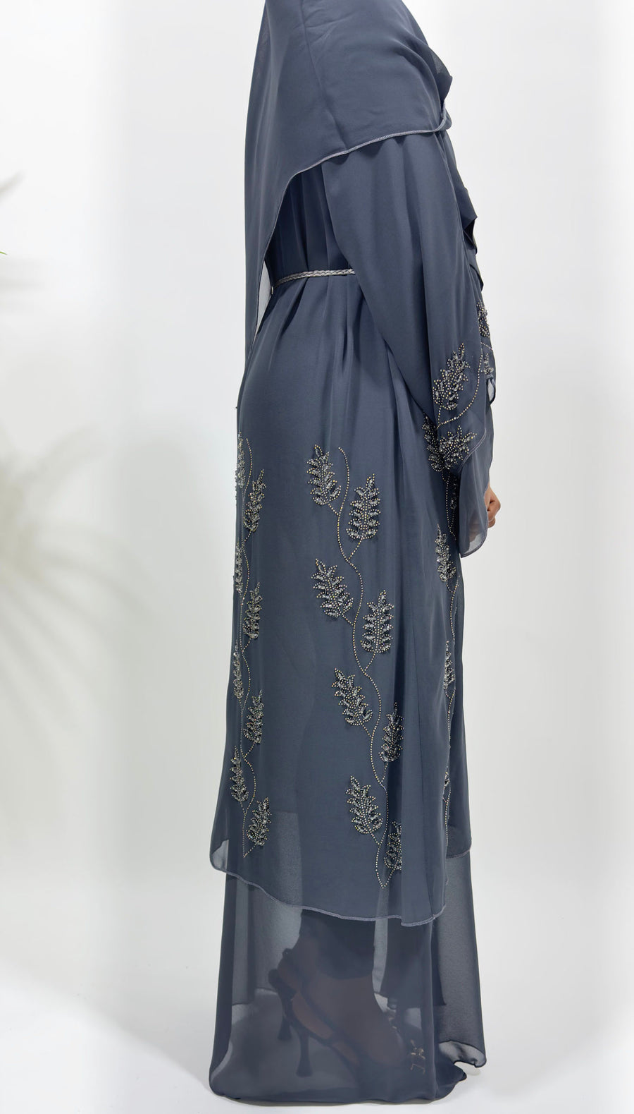Full-length view of Amani's grey double chiffon open abaya