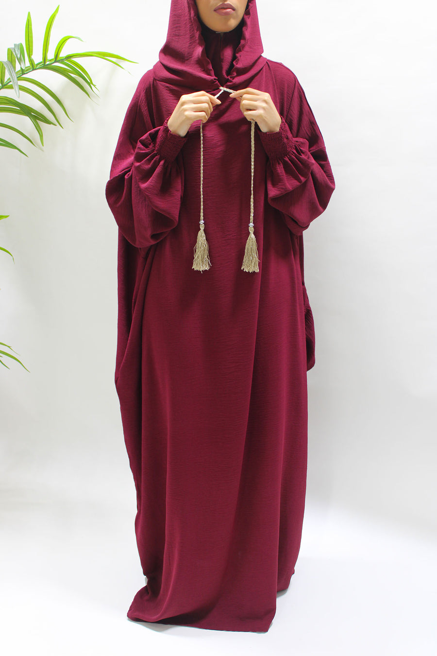 Burgundy prayer abaya showing the double hood