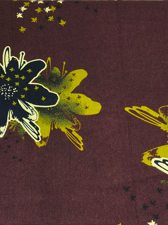 Brown floral baati dress showing the warm floral print and loose cut