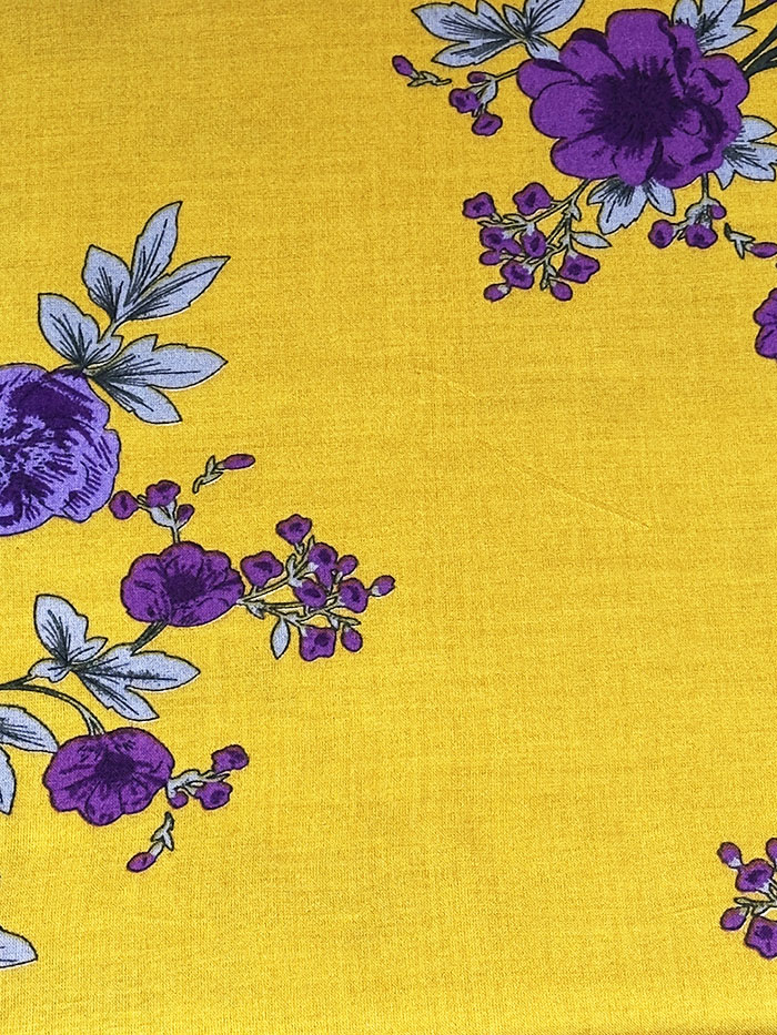 Corn yellow floral baati dress showing the loose farasha cut