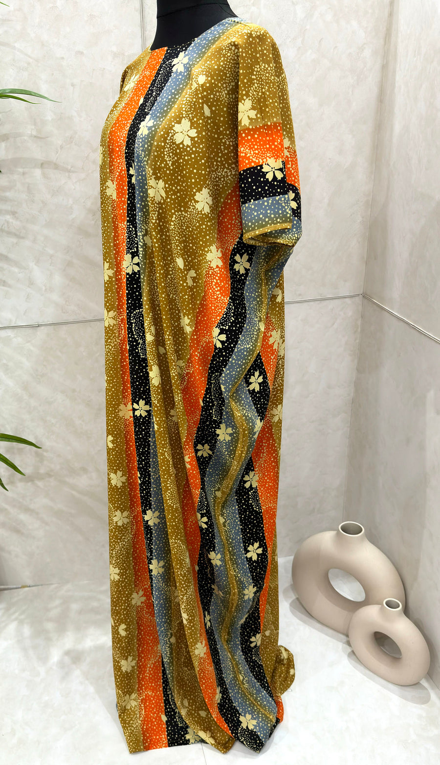 Mustard floral print cotton baati dress showing the fabric and print detail