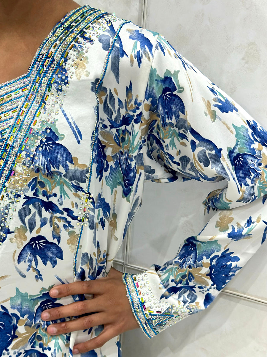 Crystal cut-work neckline detail on the blue girls' mukhawar dress